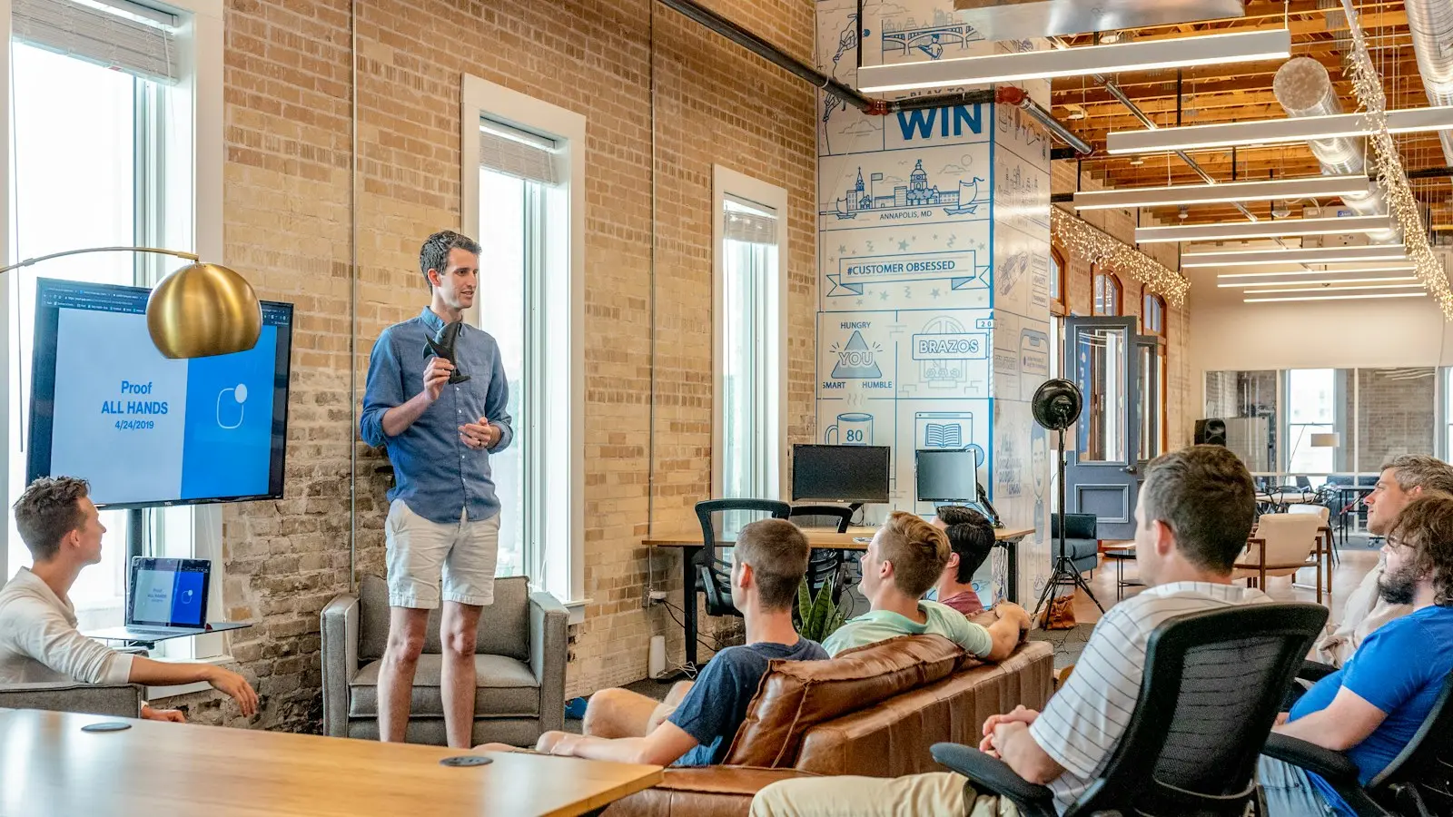 MINIMA employee in conversation at the office